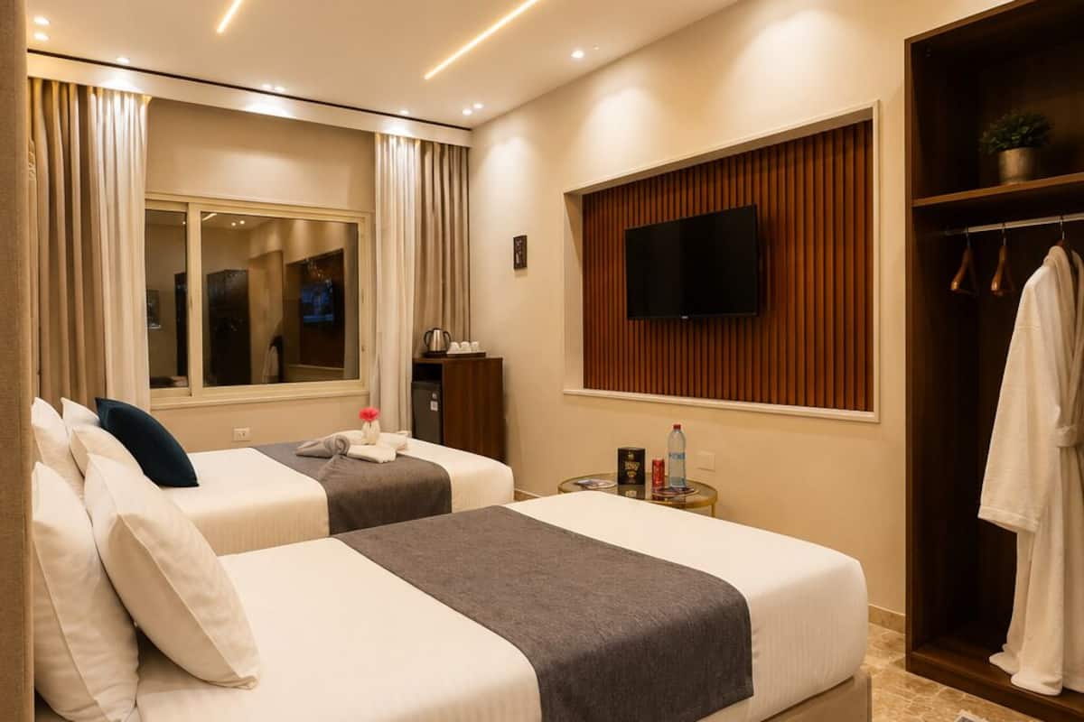 Ropa de cama de alta calidad y minibar con artículos gratuitos 