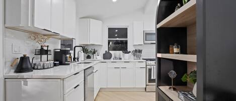 Coffee/tea maker, fridge, microwave, oven