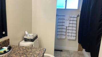 Hair dryer, towels, soap, toilet paper