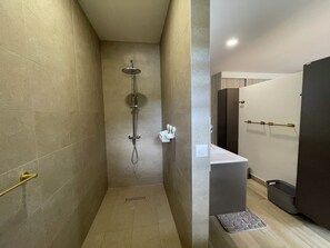 Shower, hair dryer, towels, toilet paper