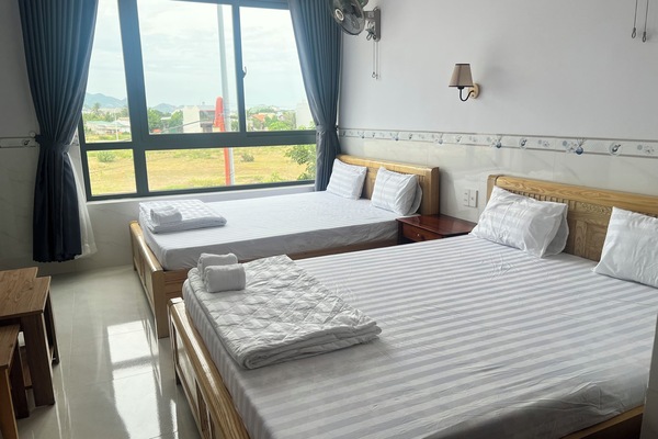 Basic Quadruple Room, City View | Desk, laptop workspace, WiFi (free)