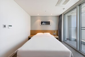 Habitación económica con 2 camas individuales | Ropa de cama de alta calidad, cortinas opacas, sistema de insonorización