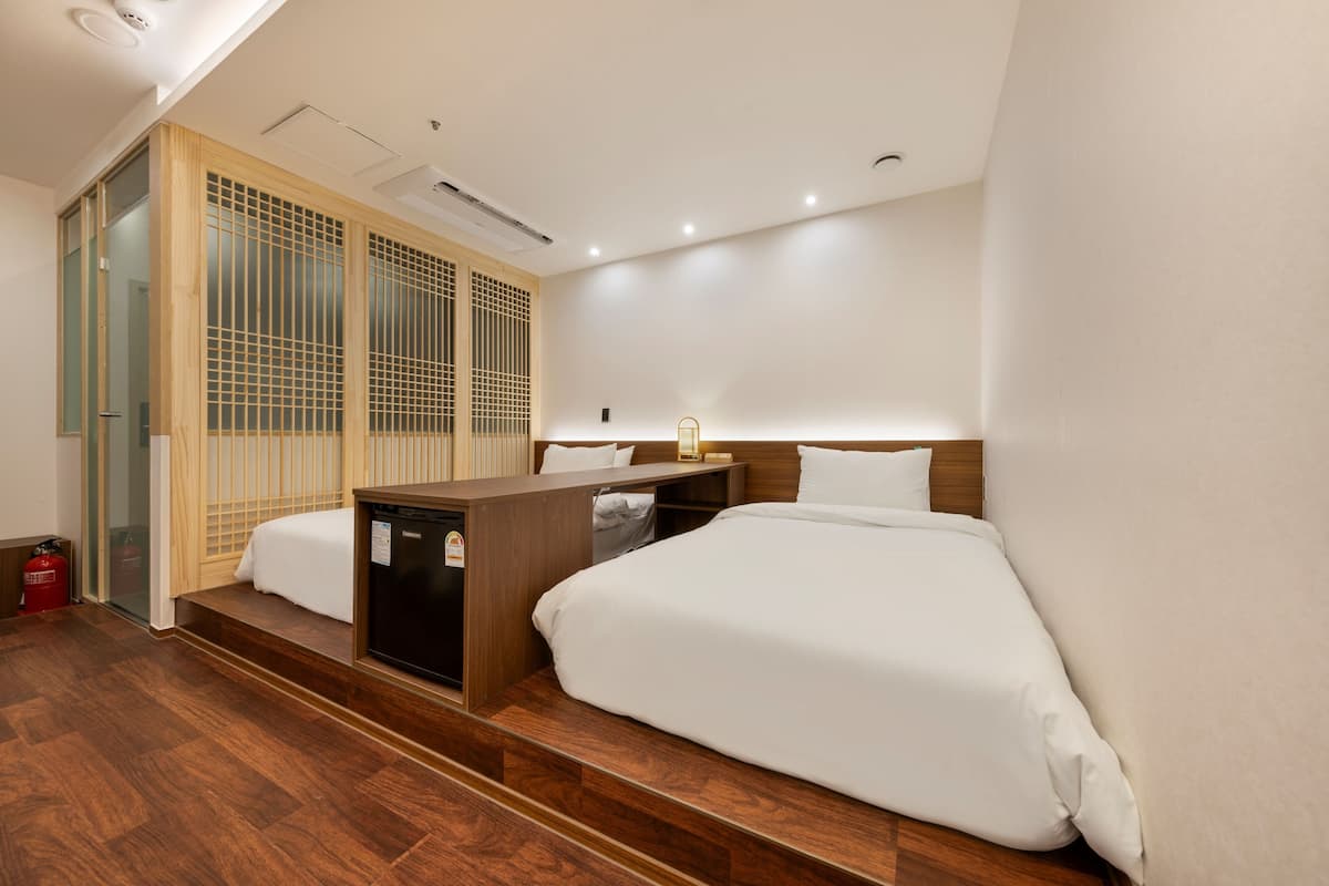 Economy Twin Room (no window) | Premium bedding, blackout drapes, soundproofing, WiFi (free)