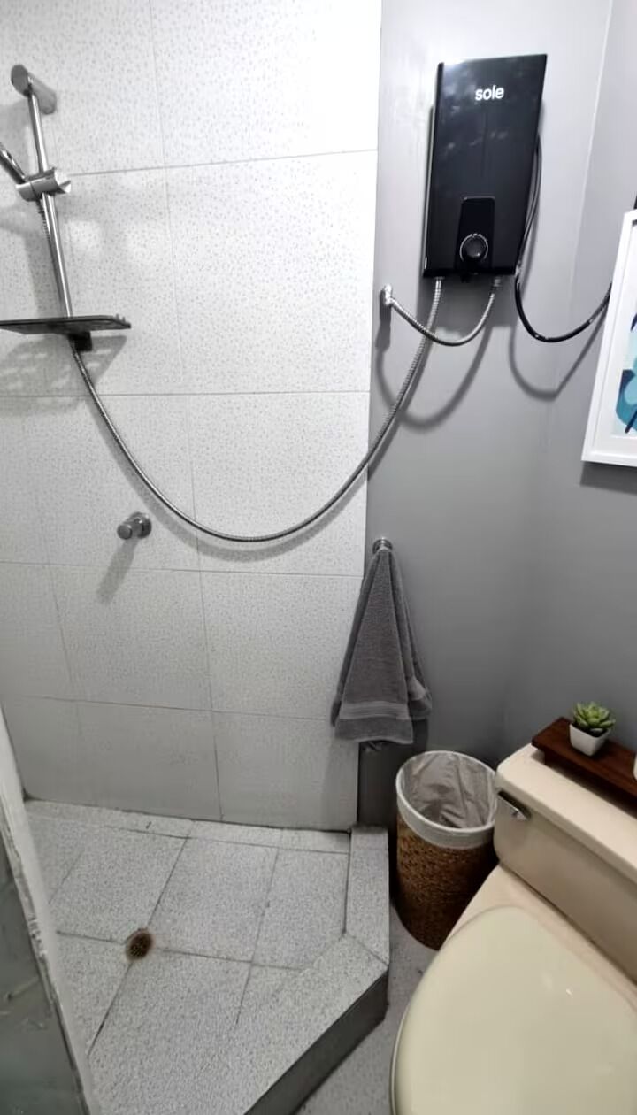 Shower, towels, soap, toilet paper