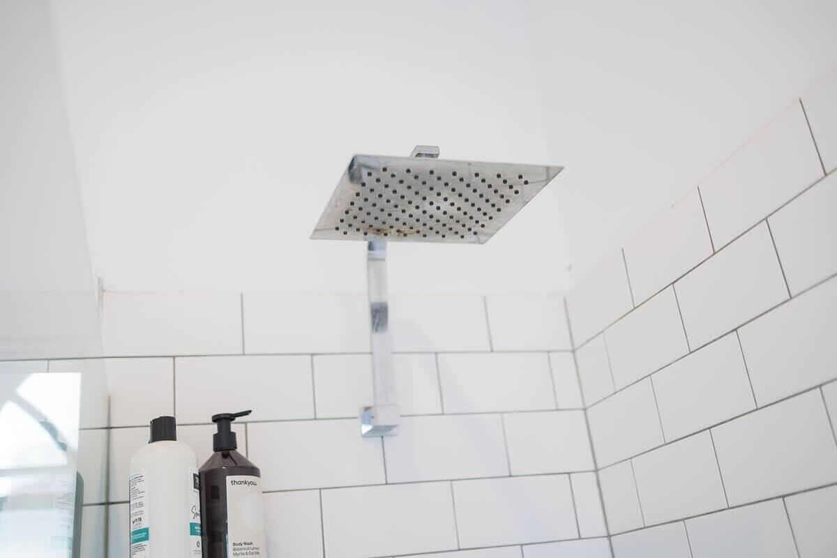 Shower, hair dryer, towels, shampoo