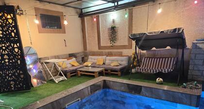 Stunning garden-level apartment with a pool and a steam room
