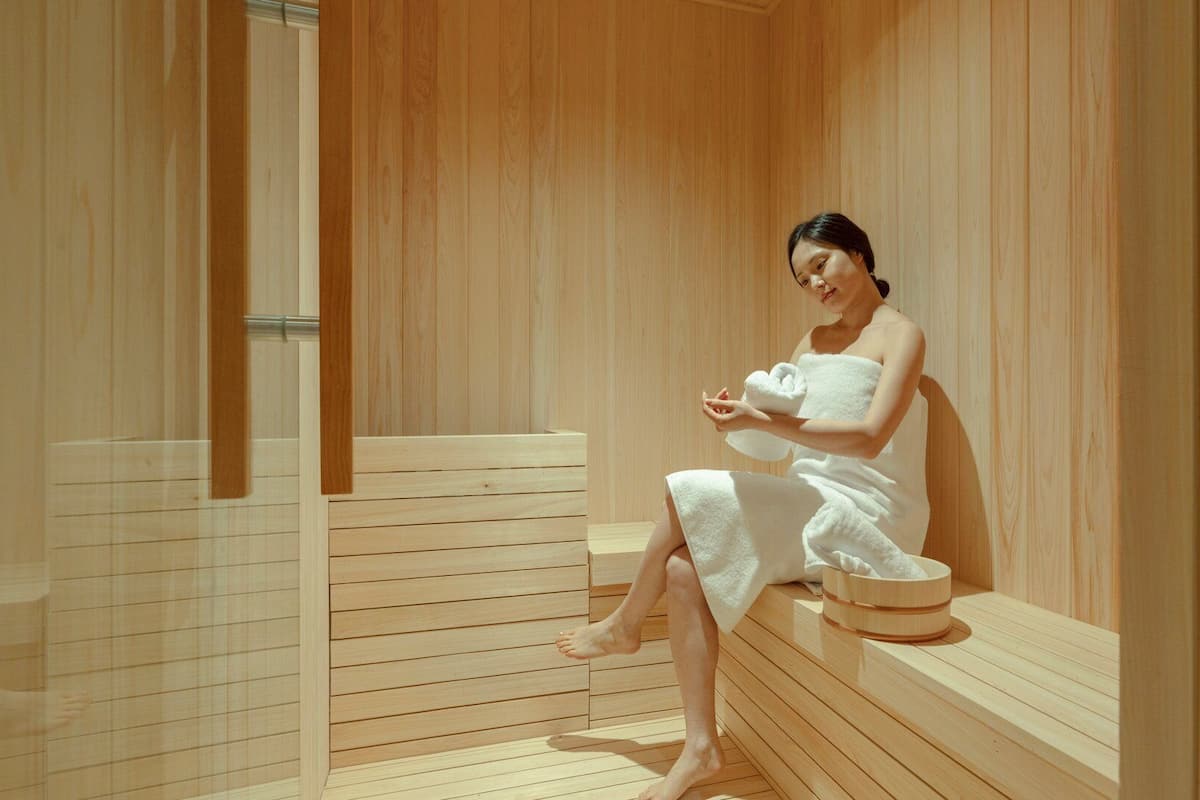 Suite Sauna | Badezimmer | Haartrockner, Hausschuhe, Handtücher, Shampoo