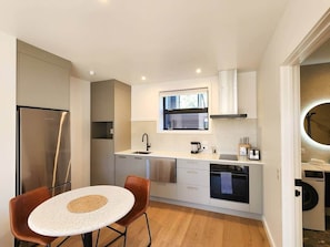 Fridge, microwave, oven, stovetop - Serenity Sands Apartment - wheelchair friendly, at reserve, close to beach (Hahei)