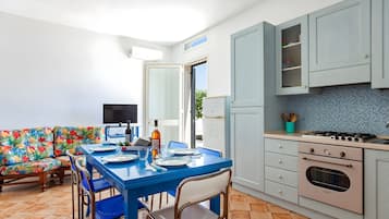 Vila família, 3 quartos, 2 banheiros (Casa Spiaggiabella - Coastal Home) | Cozinha privada