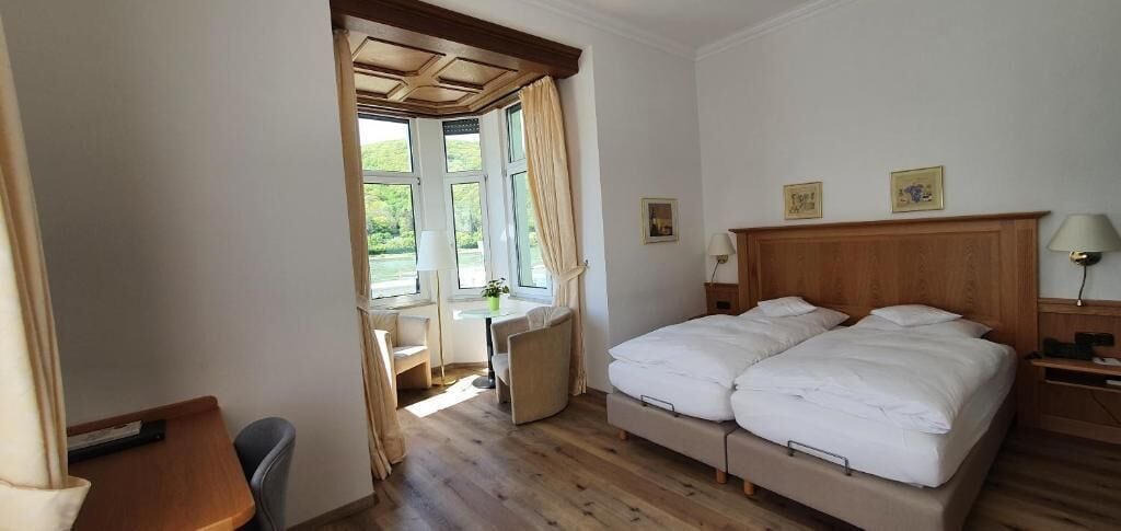 Deluxe-Doppelzimmer, Balkon | Zimmersafe, Schreibtisch, Verdunkelungsvorhänge, schallisolierte Zimmer
