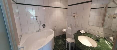 Hair dryer, towels, soap, shampoo