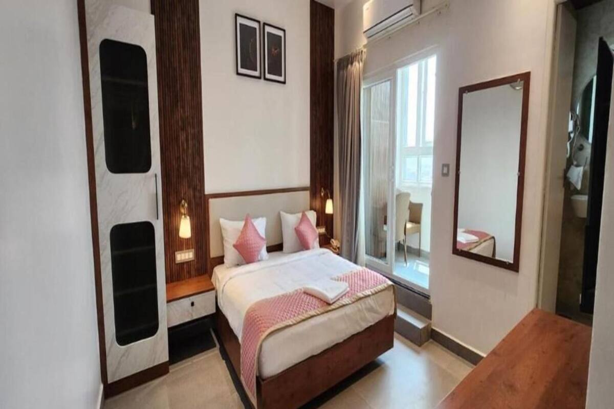 Suite, Balcony, City View | Laptop workspace, iron/ironing board (on request), free WiFi