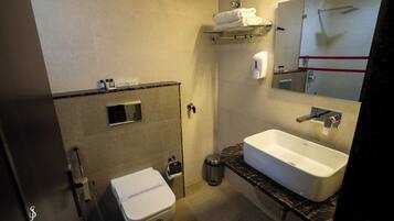 Superior Suite, City View | Bathroom | Shower, free toiletries, hair dryer, slippers