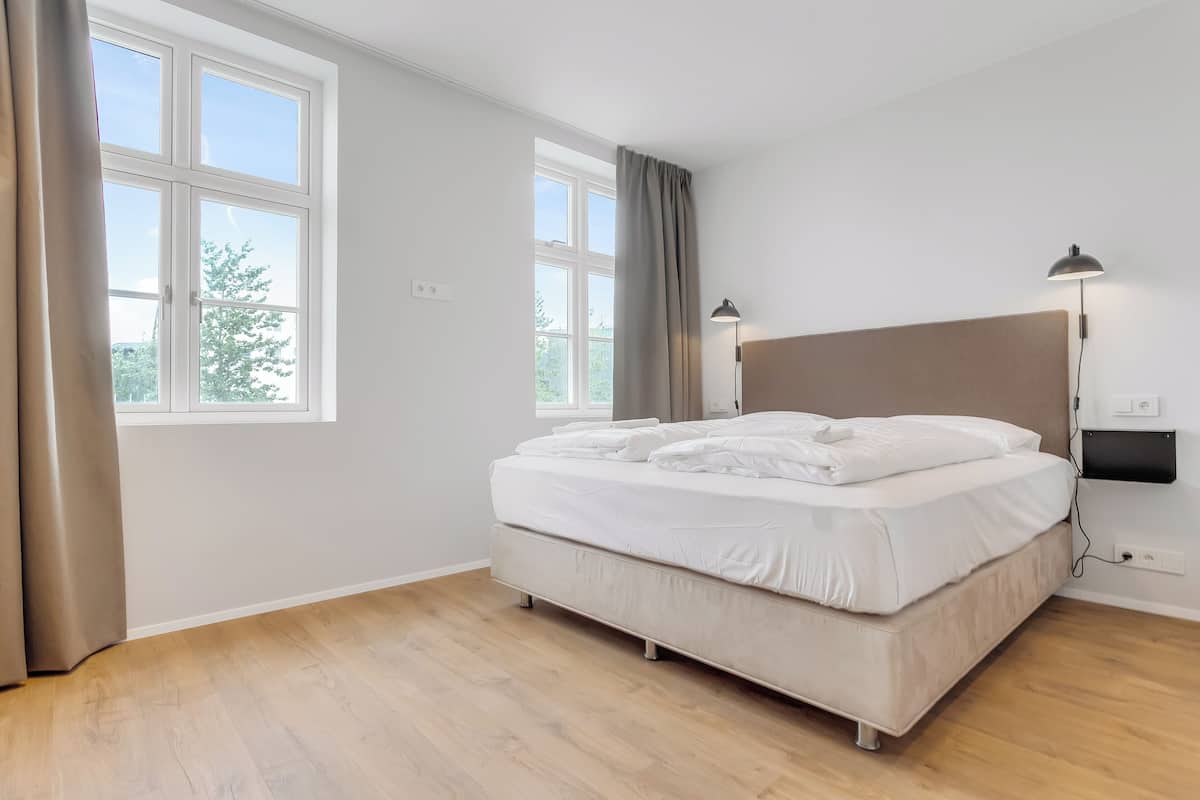 Departamento, 4 habitaciones | Escritorio, espacio para trabajar con laptop y wifi gratis