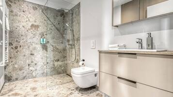 Apartment, 2 Bedrooms | Bathroom | Shower, free toiletries, hair dryer, towels