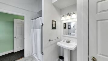 Jetted bath, hair dryer, towels, soap