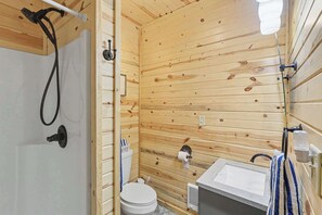 Shower, hair dryer, towels, shampoo