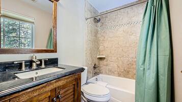 Jetted tub, hair dryer, towels, soap