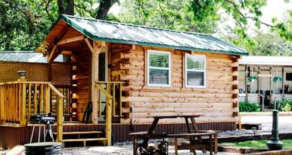 Rustic Log Cabin with Outdoor Fire Pit and Porch in Toronto, Kansas