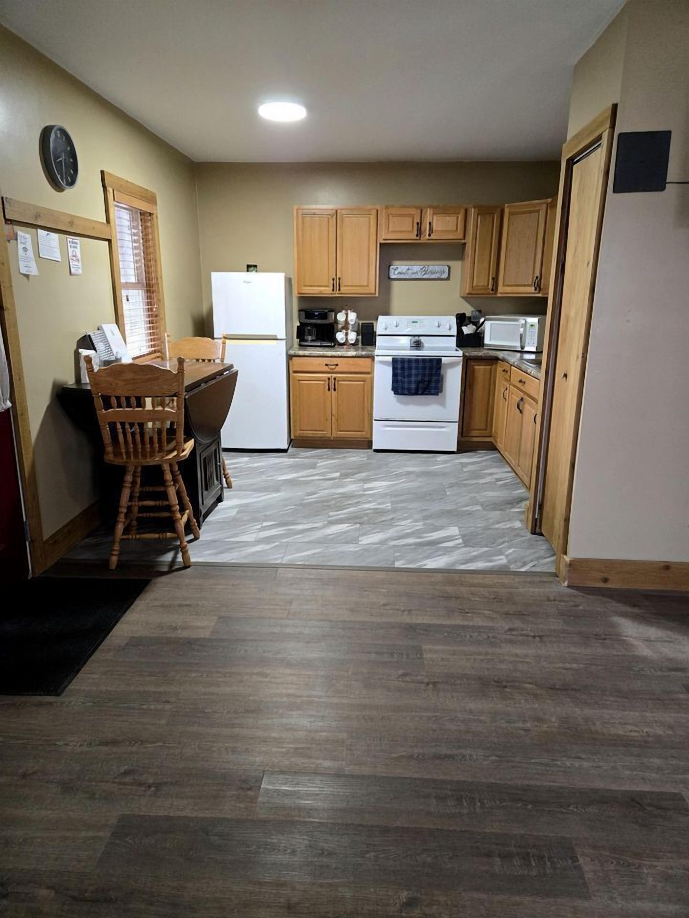 Coffee/tea maker, fridge, microwave, oven
