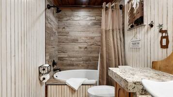 Jetted tub, hair dryer, towels, soap