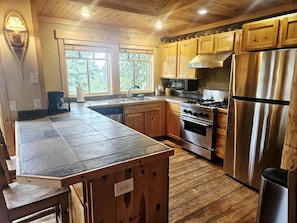 Fridge, microwave, oven, dishwasher - Secluded Ski Cabin with Hot Tub and Guest Suite at Schweitzer Idaho (Sandpoint)