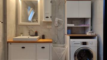 Hair dryer, towels, soap, toilet paper