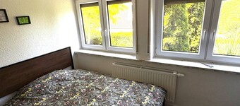 Apartment "At the Two Rivers" with Private Garden and Wi-Fi