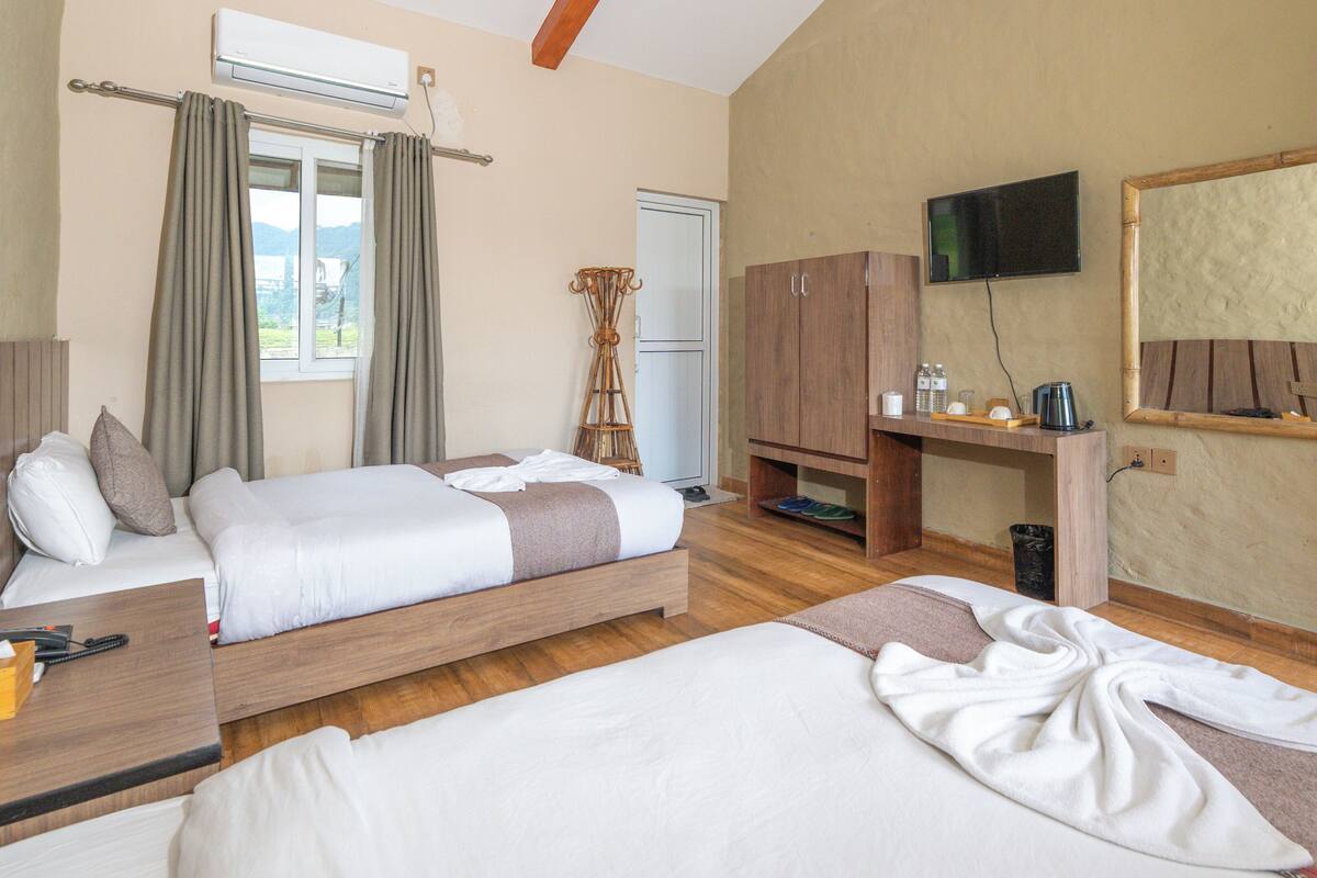 Habitación Deluxe con 2 camas individuales, vista al jardín | Escritorio, espacio para trabajar con laptop y wifi gratis