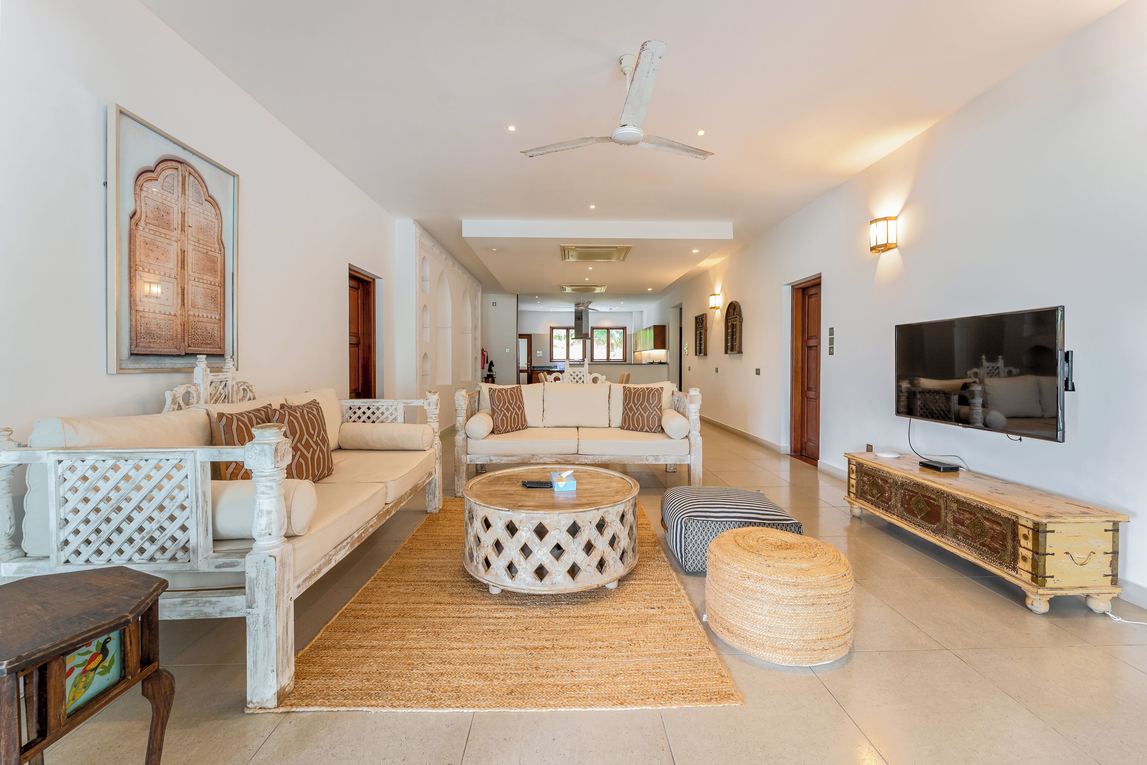 Departamento Deluxe, vista al mar | Área de sala de estar