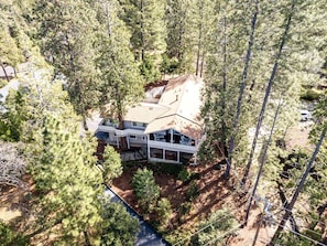A house surrounded by trees.