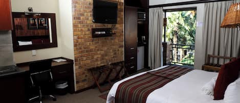 Deluxe Double or Twin Room, Patio, Garden View | Television