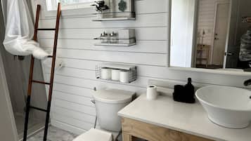 Hair dryer, towels, soap, shampoo