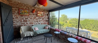 La jolie maison en grès rouge