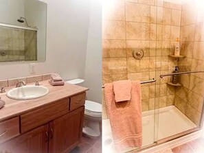 Ein Badezimmer mit Waschbecken, Toilette und Duschbereich.