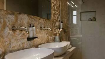 Shower, towels, soap, shampoo