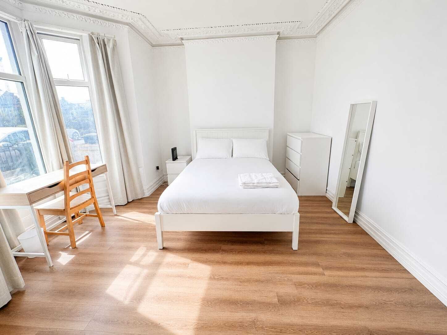 Desk, laptop workspace, free WiFi, bed sheets