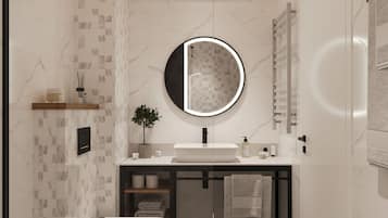 Shower, hair dryer, towels, shampoo