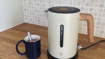 Apartment, Balcony, City View | Coffee and/or coffee maker