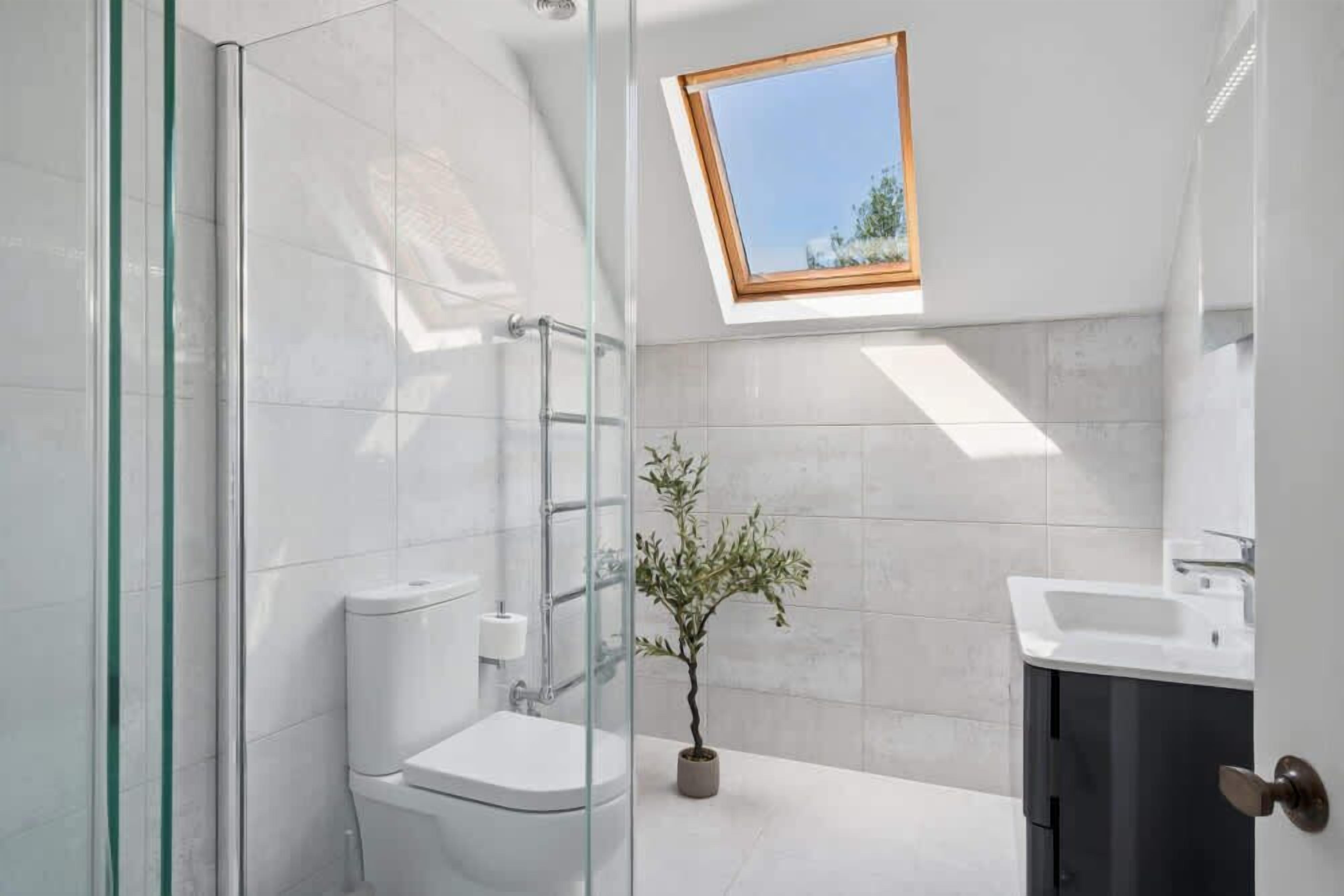 Shower, hair dryer, towels, shampoo