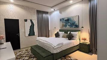 Economy Apartment, Balcony, City View | In-room safe, desk, laptop workspace, blackout curtains