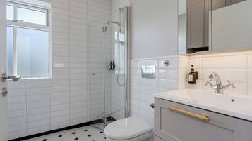 Apartment, 2 Bedrooms | Bathroom | Shower, hair dryer, towels, soap