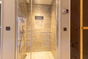 Shower, free toiletries, hair dryer, slippers