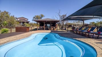 Outdoor pool, pool umbrellas, sun loungers