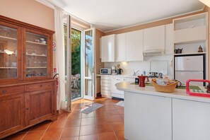 Coffee/tea maker, fridge, microwave, stovetop - Cottage Antico Ulivo Lake Como View in Bellagio with Free Parking, AC, and Patio (Bellagio)