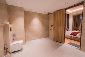 Family Room, Garden View | Bathroom - The Aura Hotel & Resort (Noida)