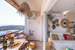 Outdoor dining - Welhomy | Studio with Ocean View & Pool | Isla Bohème (Roses)