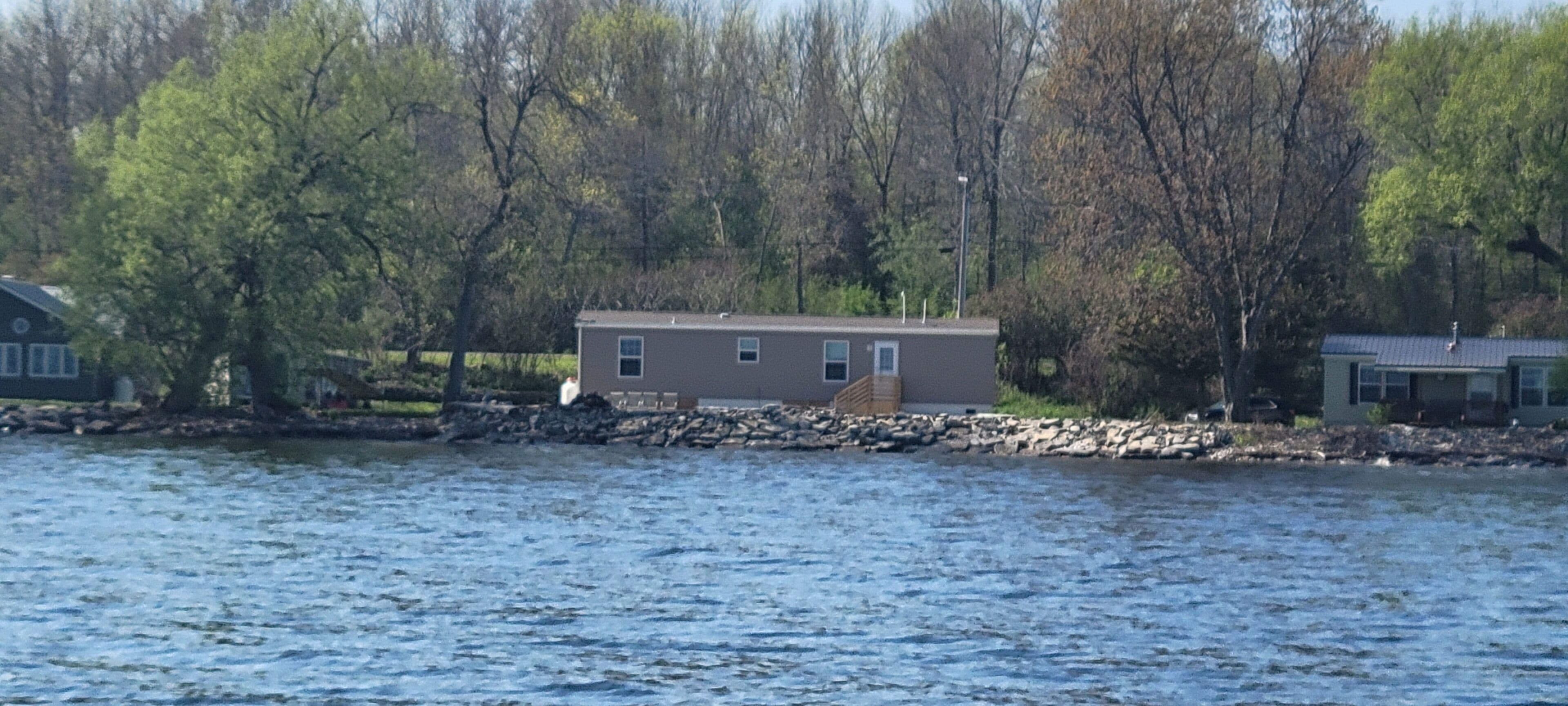 over 140 ft private shoreline and private dock on Lake Ontario