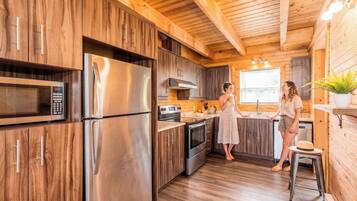 Coffee/tea maker, fridge, microwave, oven