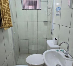 Basic Twin Room | Bathroom | Shower, towels, soap, toilet paper